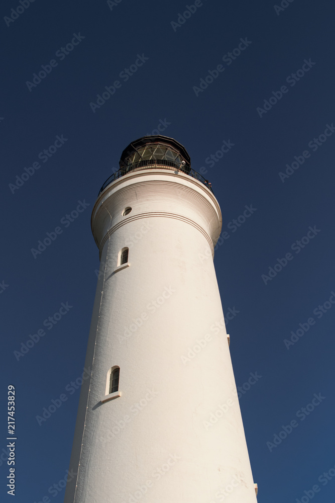 White Lighthouse, Hirtshals Fyr, with blue sky in the dunes, Hirtshals in North Jutland, Denmark