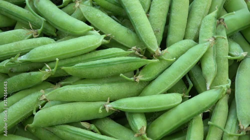 green pea pod rotating food background
green pea pod rotating food background
