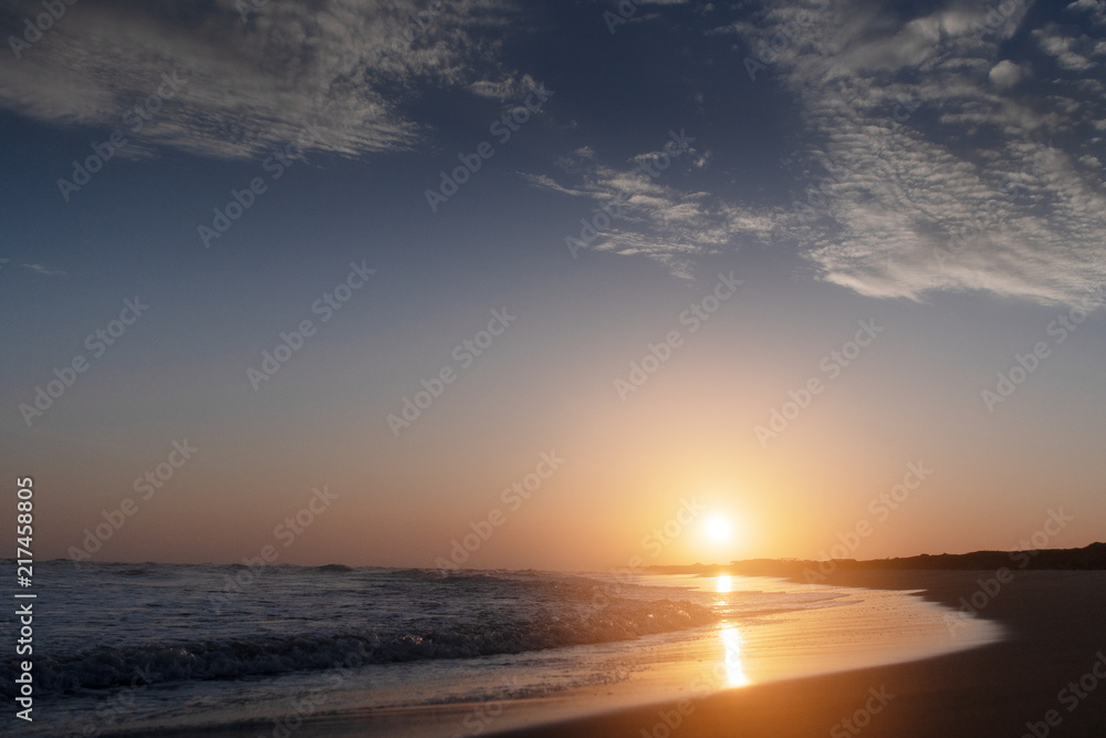 Dramatic and colorful beach sunset. Danish coastline, Lønstrup in North Jutland in Denmark, Skagerrak, North Sea