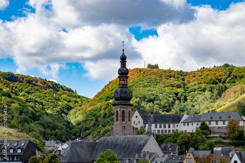 Church of cochem in front of cloudy cluw sky