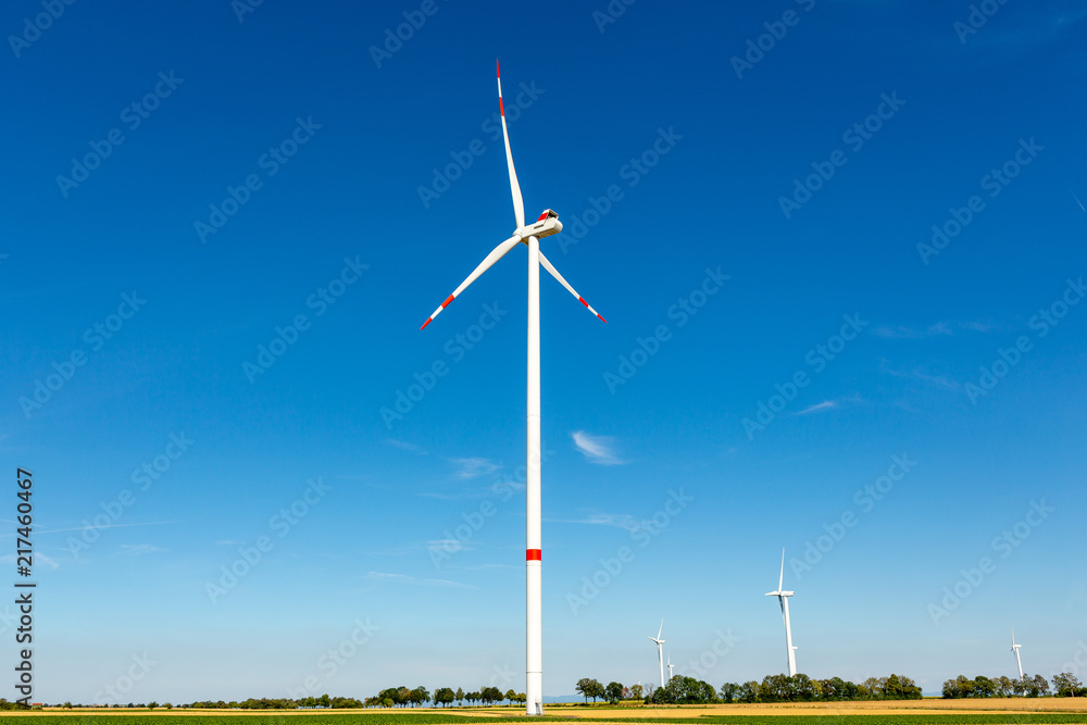 Wind turbines on a blue day