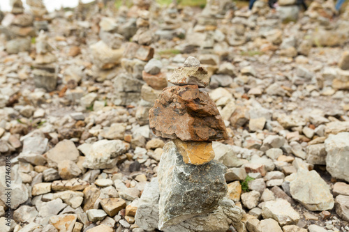 Stones stacked one on the other. Instalation near the Memorial naval aviation Cape of the Goat, France