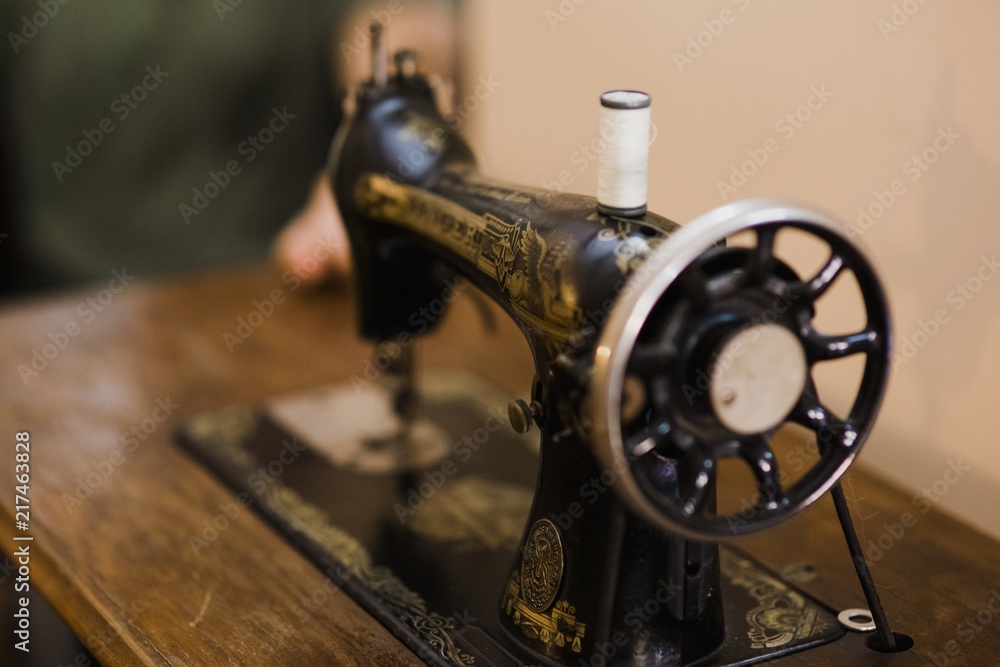 Fototapeta premium Valencia, Spain - August 10, 2018: Old automatic pedal sewing machine.