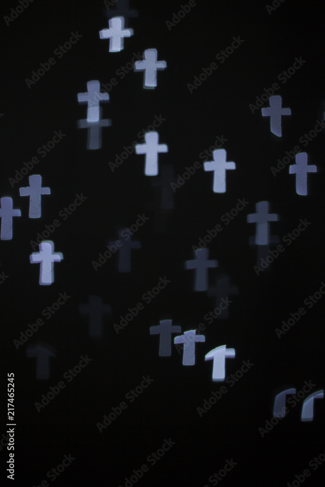 Naklejka premium Blurry blue cross light bokeh background