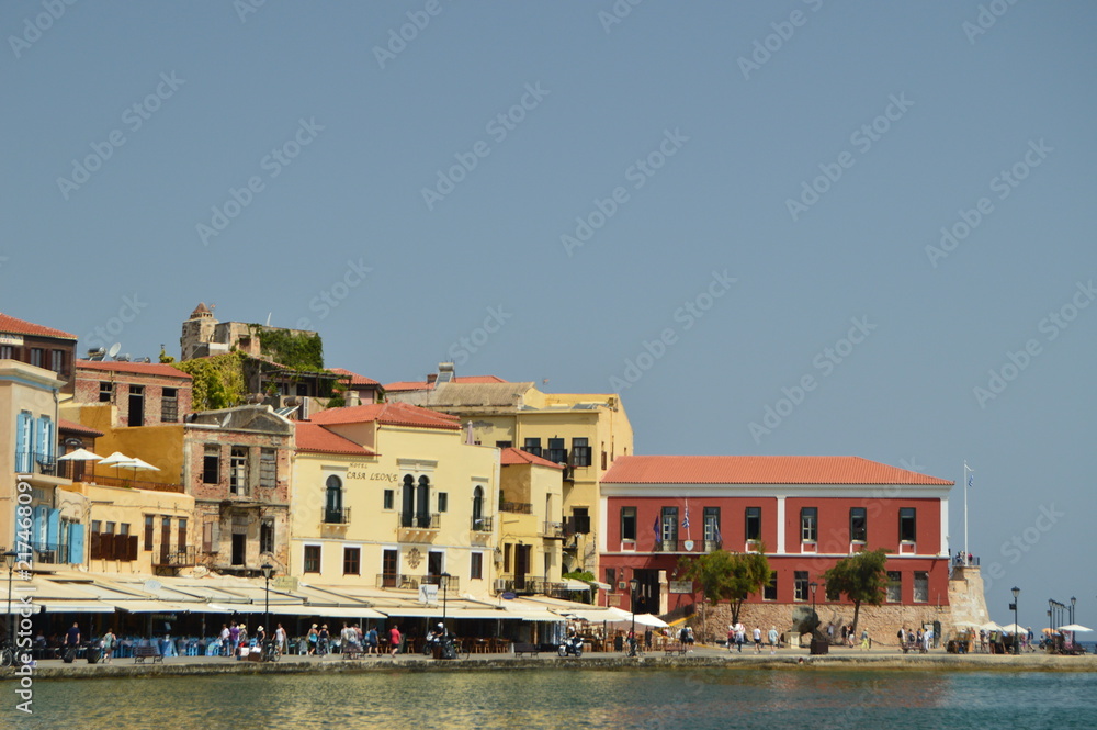 Port Of Chania With Its Beautiful Venetian Style. Houses And Restaurants Full Of Color. History Architecture Travel. July 6, 2018. Chania, Crete Island. Greece.
