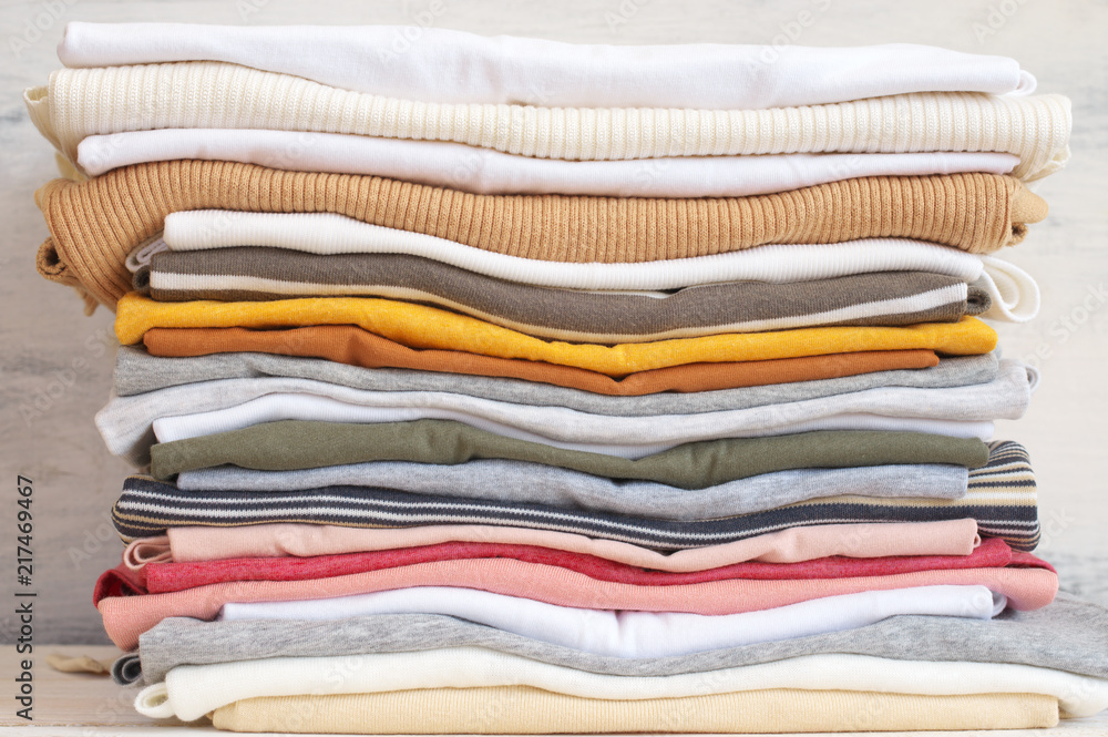 Stacked colorful t-shirts