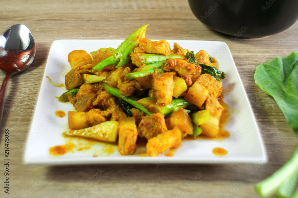 fried red curry paste with pork and chinese kale fried red curry paste with pork and chinese kale