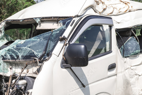 Smashed minivan after serious car accident