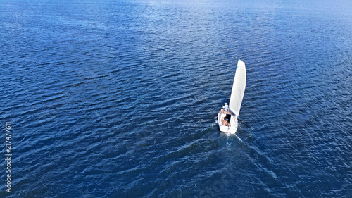 Fotografi Aerial. Sailing of yacht by the sea background.