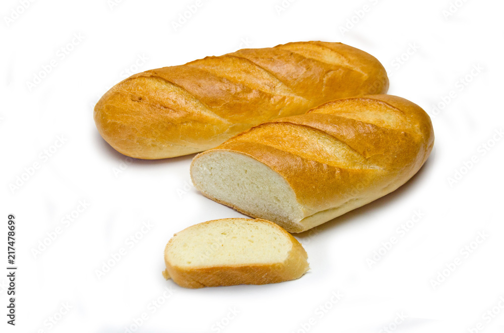 loaves of bread and a piece next to