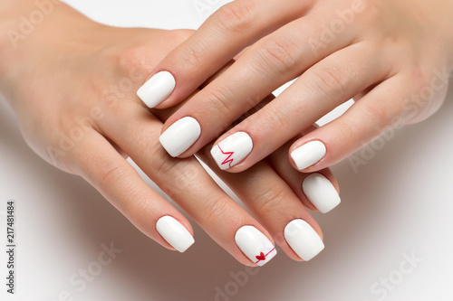 white manicure with a red heart and a cardiogram on short square nails  
