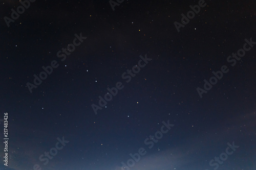 Blue dark night sky with many stars. Milky way cosmos background. The stars in the night sky. Starry blue night sky. Night scape with beautiful starry sky. Star texture. Space background