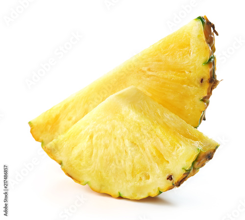 slices of pineapple fruit isolated on white background