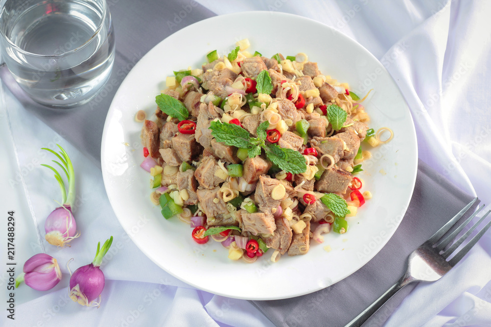 Spicy grilled pork salad with lemon grass and ginger Spicy grilled pork salad with lemon grass and ginger