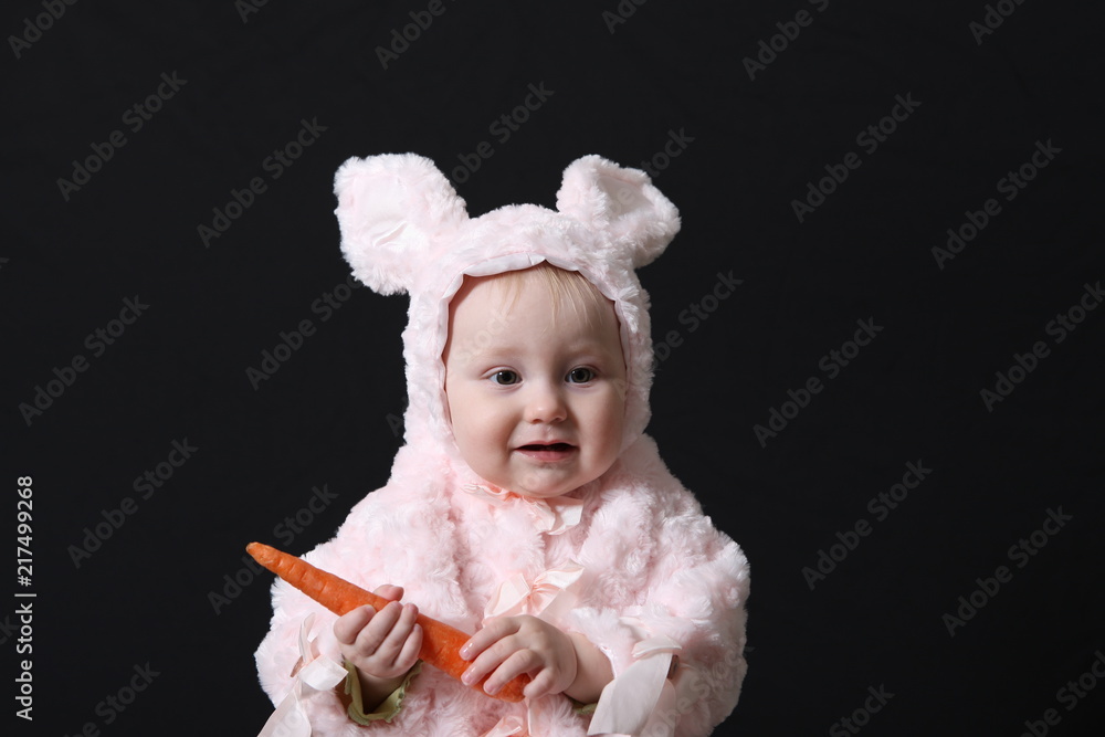 Portrait of the baby holding vegetables Portrait of the baby holding vegetables