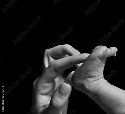 foot of newborn baby  © Studio13lights