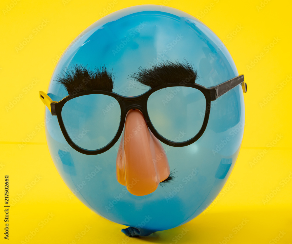 Blue Ballon with funny mask Blue Ballon with funny mask