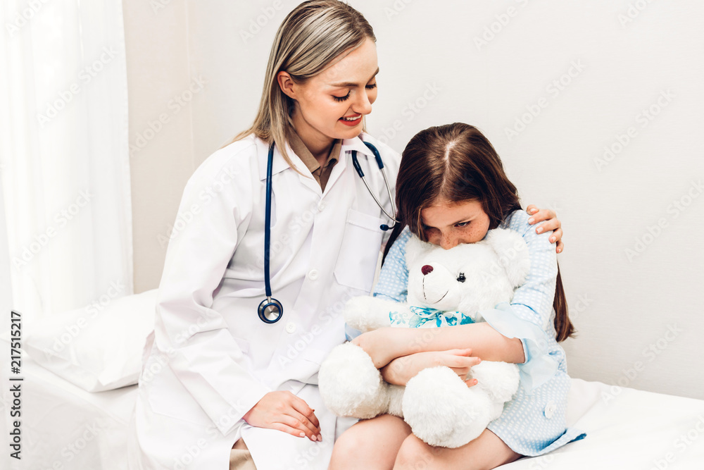 Doctor consulting and consulting with little girl in hospital.A little girl has sick.healthcare and medicine Doctor consulting and consulting with little girl in hospital.A little girl has sick.healthcare and medicine