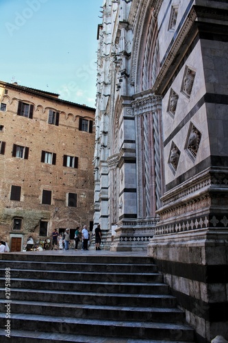 A view of the stais and the decorative elements of a baptistery in Siena, italy photo