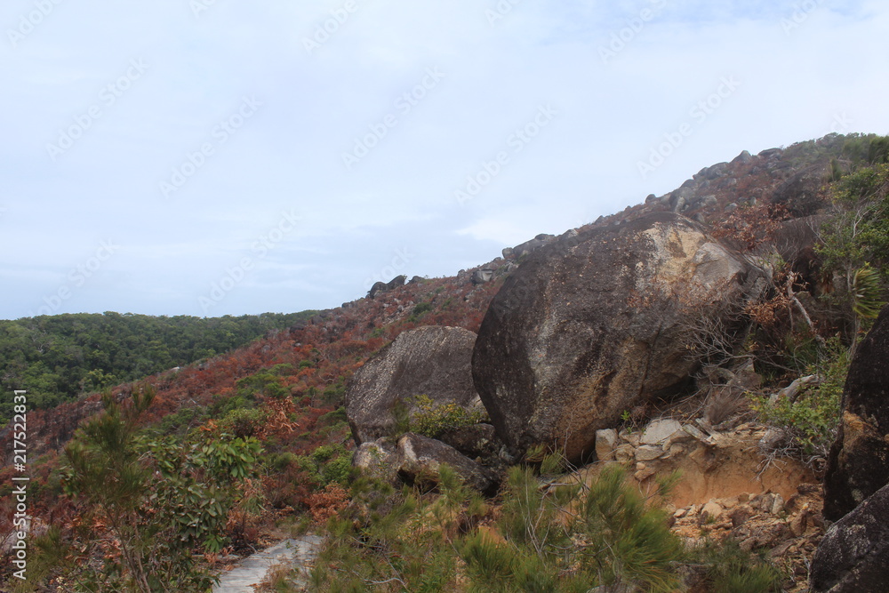 Boulders on a red hill