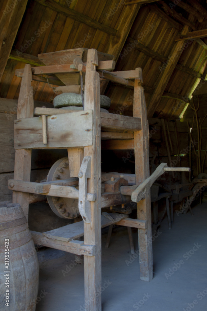 Ancient wooden  millstone 