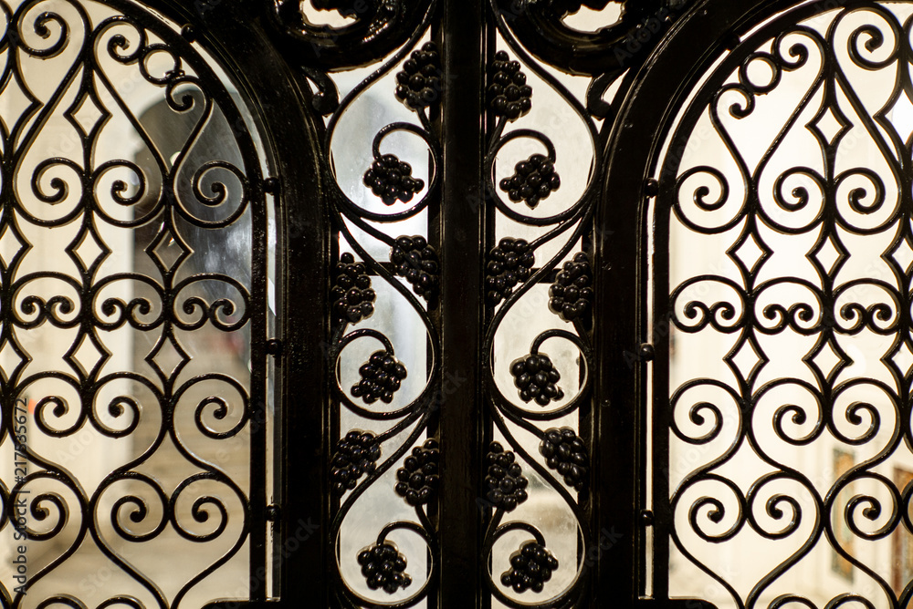Detail of a glass door in Barcelon at night