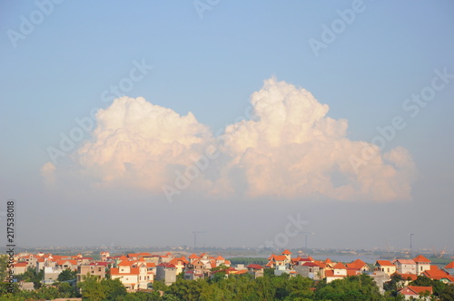Clouds and houses at sunset in Hanoi, Vietnam