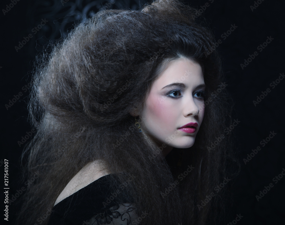 Fashion portrait of young beautiful woman with jewelry and elegant hairstyle.Perfect make-up. Beauty style model.Close up. Fashion portrait of young beautiful woman with jewelry and elegant hairstyle.Perfect make-up. Beauty style model.Close up.