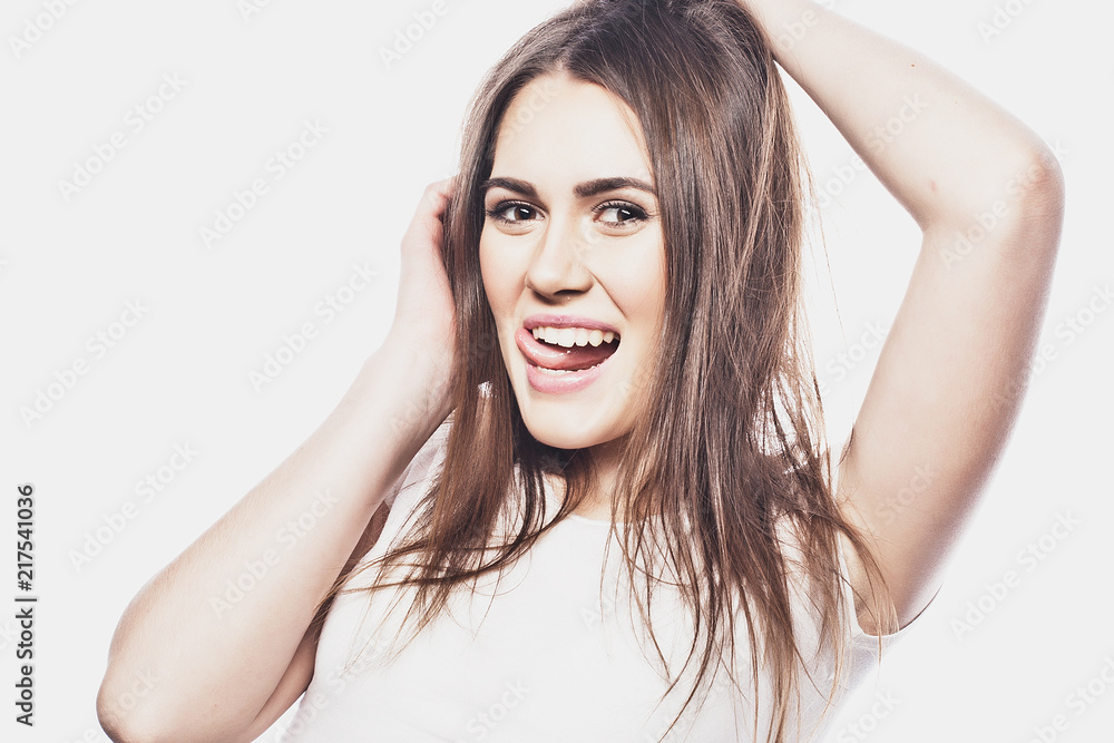 Young smiling blond girl on white background Young smiling blond girl on white background