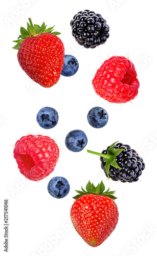 Berries in the air. Falling blackberry, raspberry, blueberry and strawberry fruits isolated on white