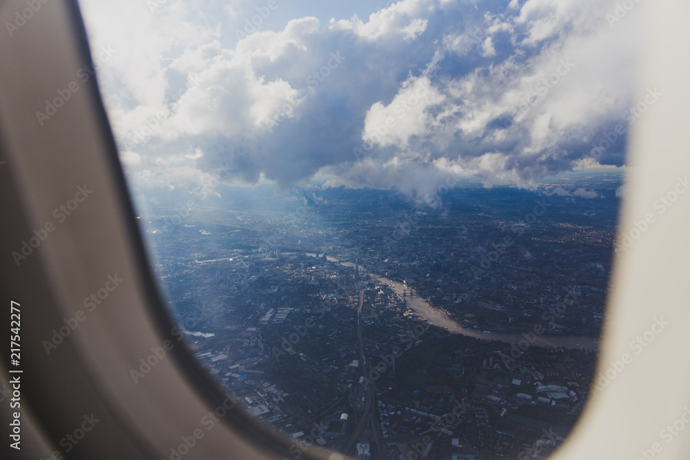 aerial view of the city of London from airplane window seat aerial view of the city of London from airplane window seat