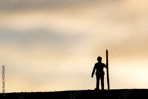 Abstract,silhouette Model people mining on sky sunset background.