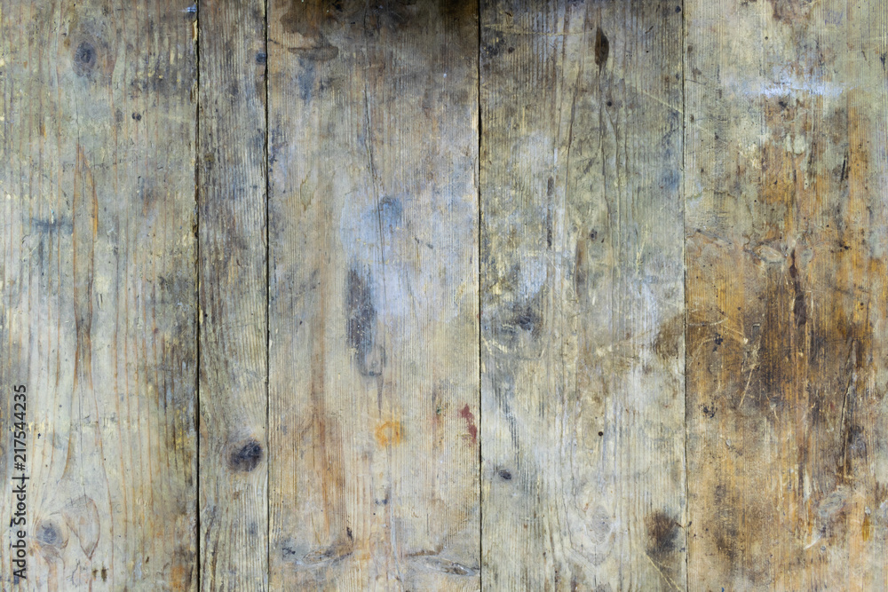 Old wooden planks from a workbench that are dirty and soiled with oil and rust - obrazy, fototapety, plakaty 