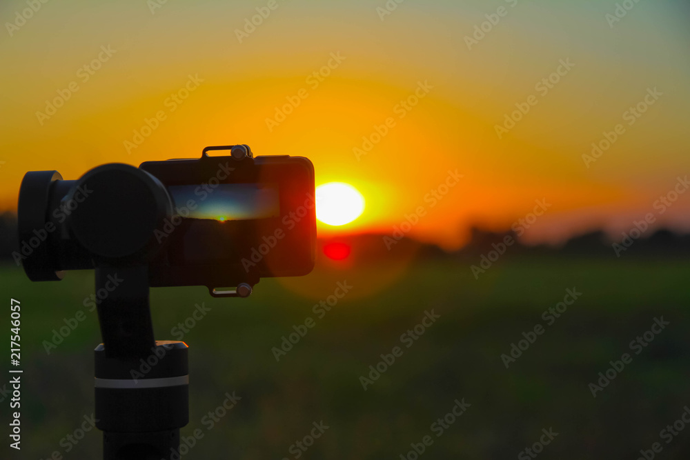 Closeup actioncam filming sunset