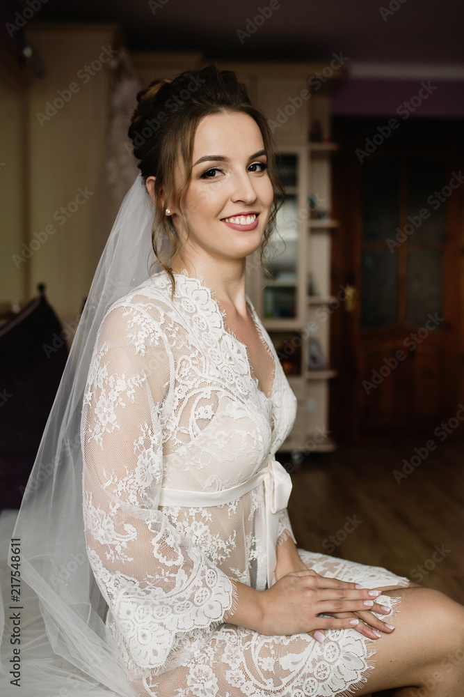 Naklejka premium Portrait of a young beautiful sexy tender bride . Bride's mornin