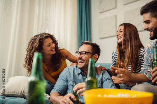 Photography Portrait of group of friends having fun at home and enjoying together