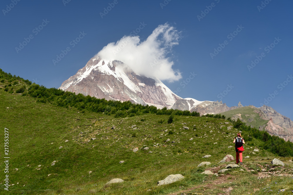 Treking in the mountains of the Large Caucasus. Road for the Kazbek peak. Stepantsminda, Georgia