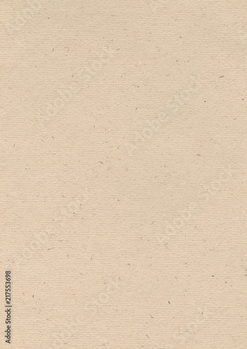 Cardboard background. Cardboard texture. Beige background. Paper for creativity. Aged background. Rough surface.