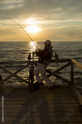 Fishing. Spinning at sunset