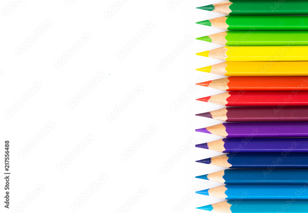 Closeup top view colored pencil on white background with copy space Closeup top view colored pencil on white background with copy space