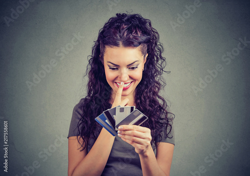Bilde på lerret Happy woman with plenty of credit cards