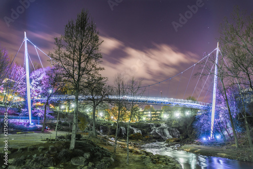 Liberty Bridge at night in Falls Park - from behind