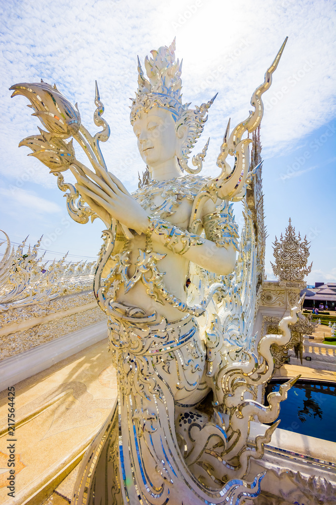 Fototapeta premium White statue of the Wat Rong Khun temple in Chiang Rai, Thailand in Asia