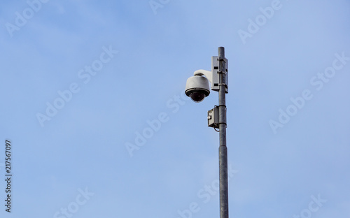 outdoor video surveillance camera , dome security camera on the street.