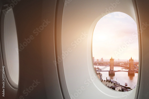 travel to London, view of Tower Bridge from window of airplane, tourism