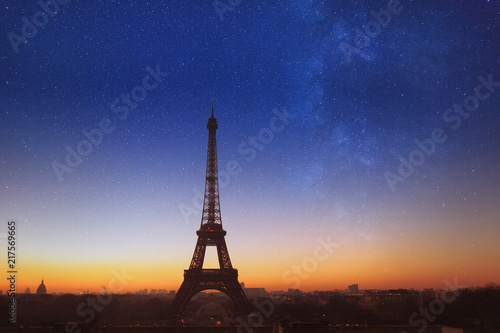 night in Paris with blue starry sky, beautiful romantic view of Eiffel Tower with stars, France