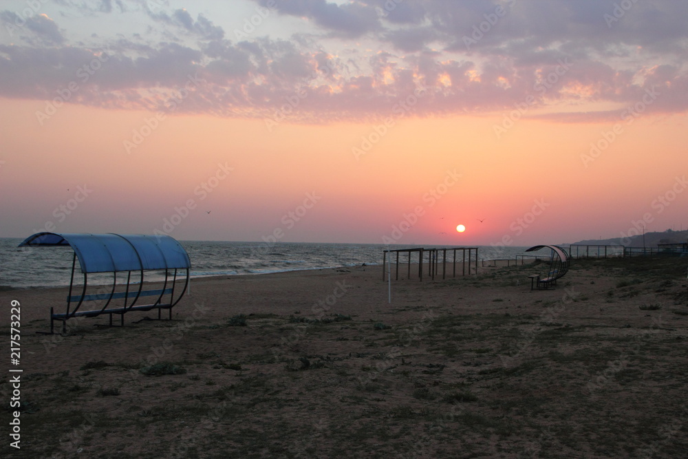 Beautiful Dawn on the well-equipped beach of the Sea of Azov