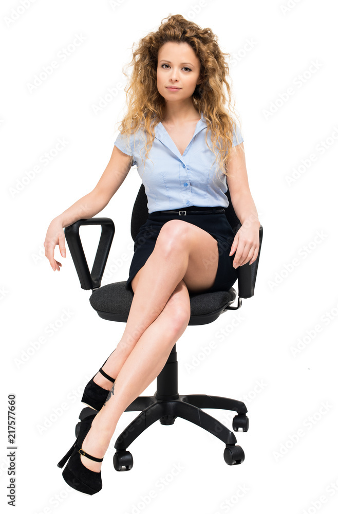 Portrait of a smiling businesswoman sitting on a chair Portrait of a smiling businesswoman sitting on a chair