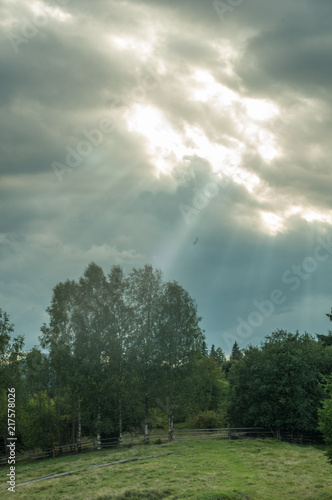 Carpathian mountains meadow  sun rays under the hills  clouds 2