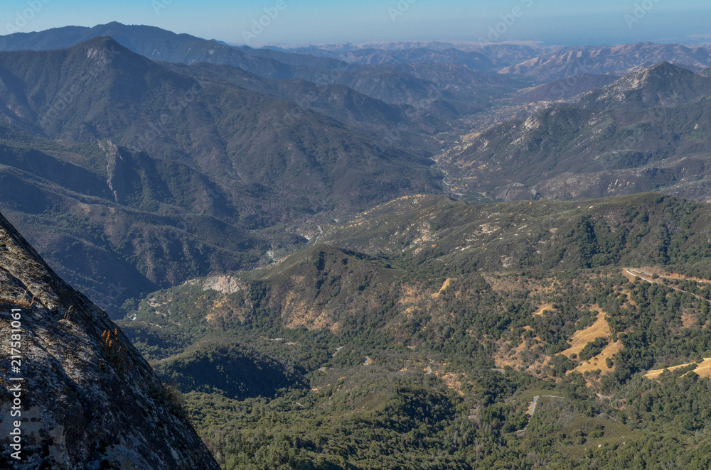 view of Generals Highway, Peaks Ridge, Kaweah river and San Joaquin valley from Moro Rock trail Sequoia National Park, California, USA